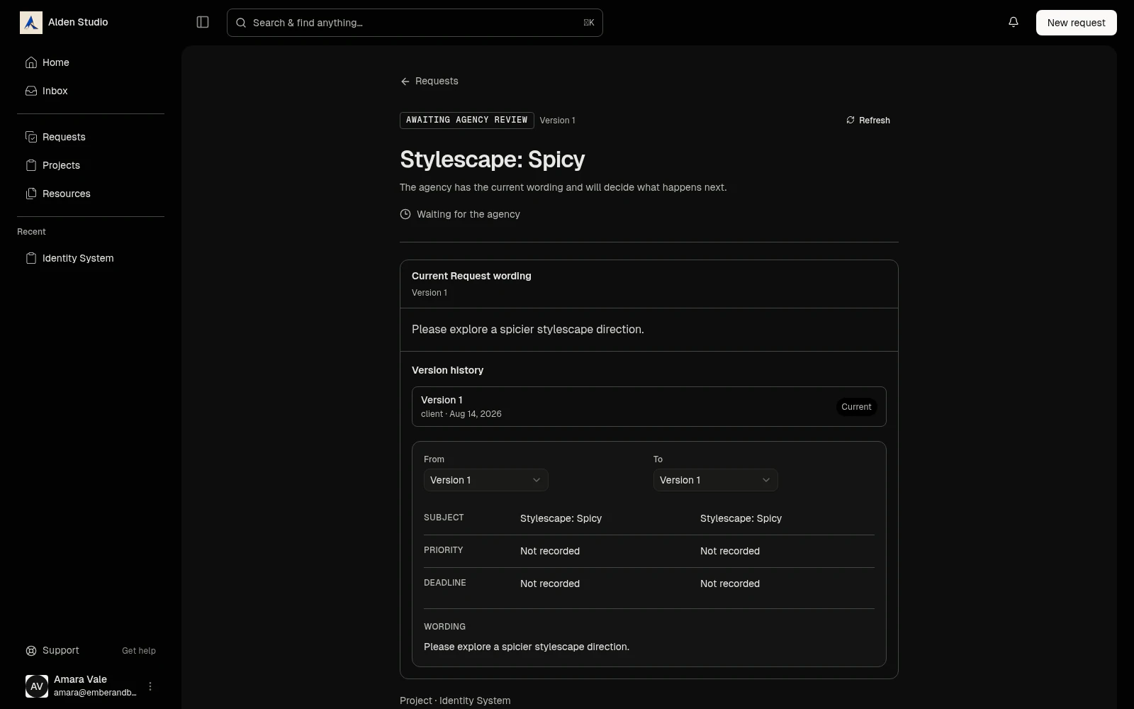 A client request in the portal showing its current wording and version history